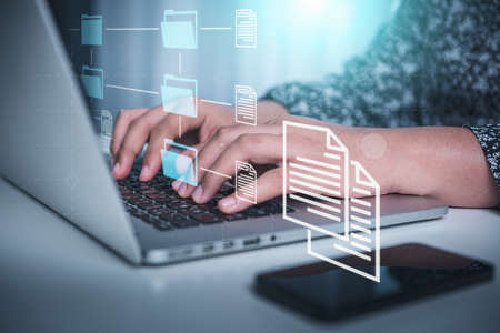 Document Database Management Storage on Digital Cloud Computing Network System. Businesswoman Woking on Laptop Computer While Managing Corporate Documentation Files. Technology Digital Transformationの写真素材