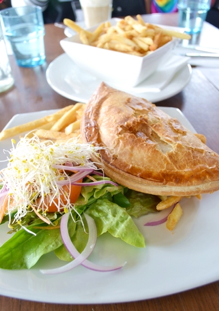 meal with bread, vegetable and chip