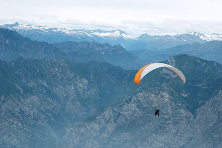 Paragliding in the Alps with mountains scenicsの写真素材