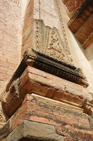 Ornamental carvings on brick column of Buddhist templeの写真素材