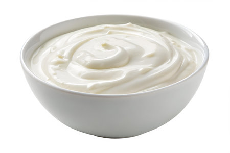 Close-up of a bowl filled with creamy, swirled yogurt. Perfect for healthy eating or cooking concepts.の写真素材