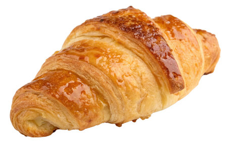 A freshly baked croissant with a glossy glaze, showing layers of flaky pastry. Delicious!の写真素材