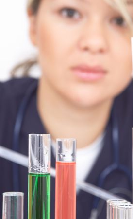 Researcher working with tubes at the laboratory