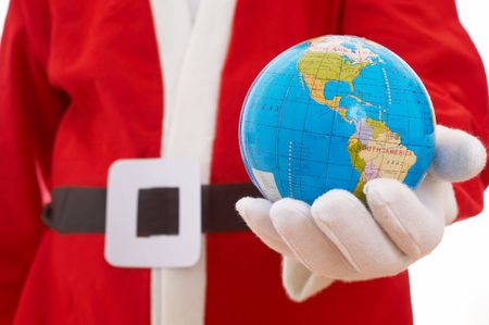 Santa claus holding mini world, shallow dof, focus on worldの写真素材