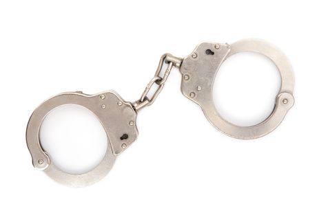 handcuff close up on white background