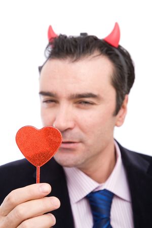 love concept with a liar holding heart shape on white