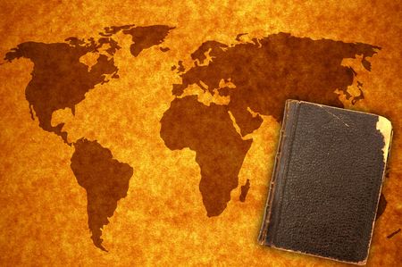 world map and book on old page background for your...