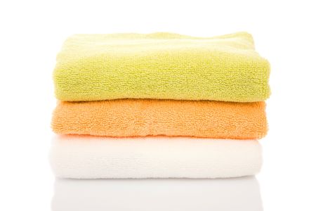 colorful towels on white for health and beauty conceptの写真素材