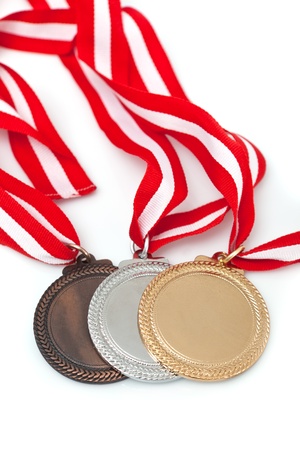 Gold, silver and bronze  medals  with ribbonsの写真素材