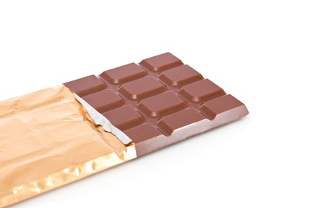 Chocolate bar in wrapper isolated on white backgroundの写真素材