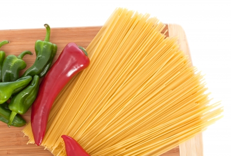 Uncooked spaghetti bolognaise with capsicums の写真素材