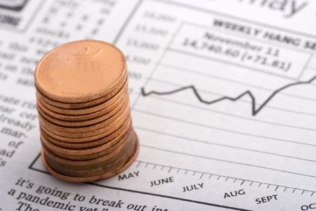 Coins Over Charts close up