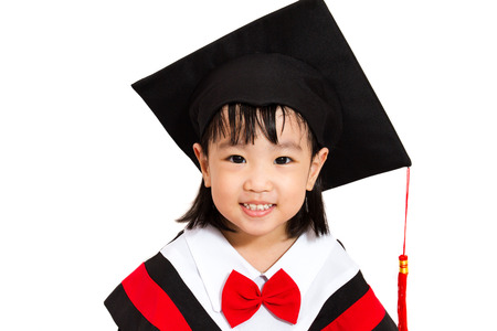 Chinese little girl graduation on white backgroundの写真素材