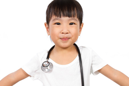 Asian Little Chinese Girl With a stethoscope isolated on white backgroundの写真素材