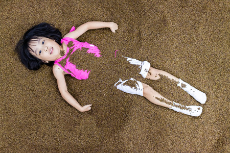 Asian Chinese Little Girl Playing with sand at indoor playgroundの写真素材