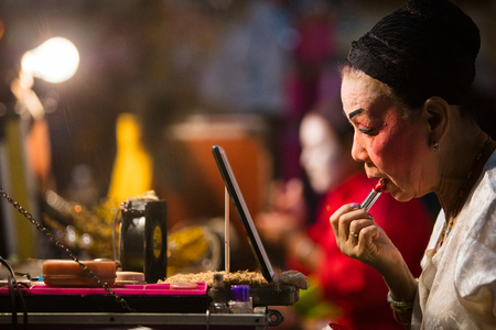 A group of Chinese Opera member prepares at backstage for a performance in Tanjung Sepat, Selangor, Malaysia on Wednesday, Jul. 19, 2017. 

The Opera Group is from Thailand Shengngoy Troupe, they perform the opera in Chinese Teochew dialect.のeditorial素材
