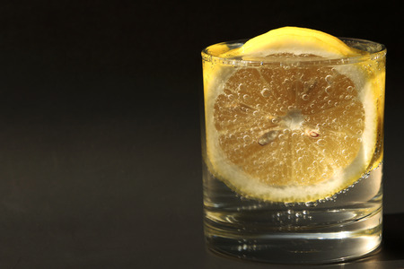Lemon soda on black background.の写真素材