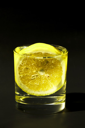 Lemon soda on black background.の写真素材