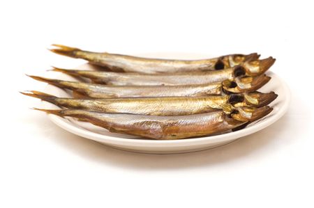 smoked fish on the plateの写真素材