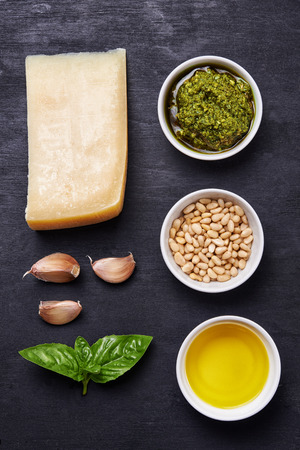ingredients for pesto over dark background. top viewの写真素材