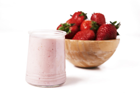 strawberry yoghurt and bowl od strawberies isolated on white backgroundの写真素材