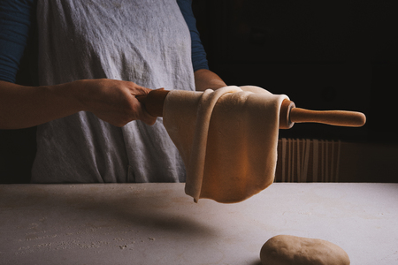 dough in female hands. toned mageの写真素材