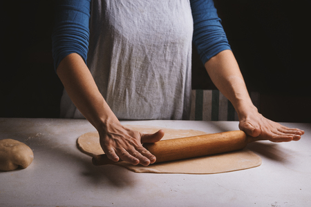 dough in female hands. toned mageの写真素材
