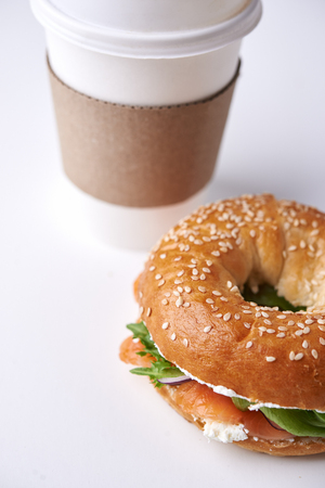 bagel with salmon and coffee to goの写真素材