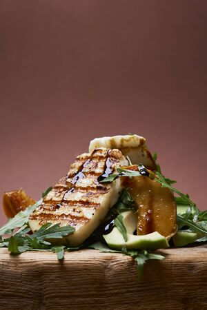salad with grilled halloumi and fried peachesの写真素材