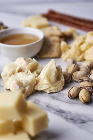 cheese board with different type of cheese, nuts and fruits