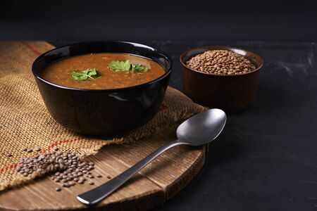 bowl with red lentil soup with cilantroの写真素材