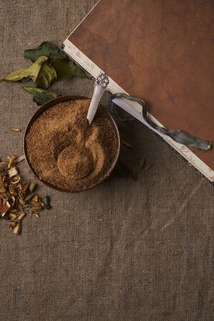 bowl with coconut sugar on burlap. top viewの写真素材