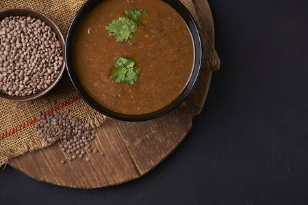 bowl with red lentil soup with cilantroの写真素材