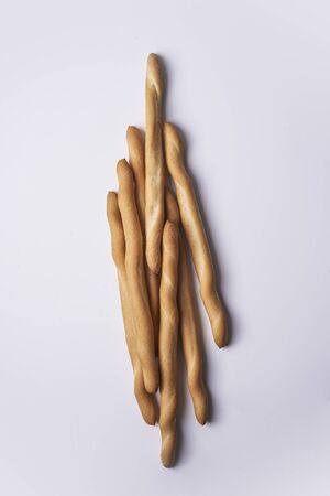 grissini: breadsticks on white background. Italian causineの写真素材