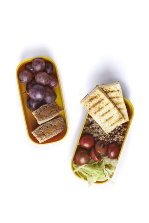 balanced bento lunch isolated on white backgroundの写真素材