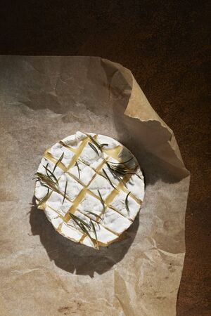 baked cheese brie with rosemaryの写真素材
