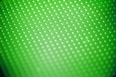 green color on a blur abstract backgroundの写真素材