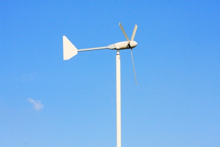 wind turbine on blue skyの写真素材