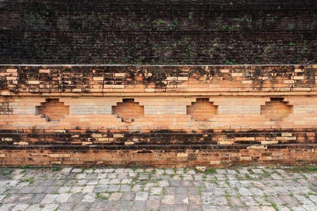 An ancient brick wall of Buddhist templeの写真素材