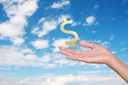 hand holding dollar with blue sky background, conceptの写真素材
