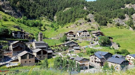 Beautiful architecture of natural stone buildings in the village of Pal on the side of the...