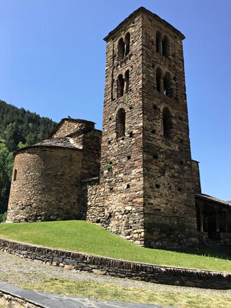 Very old church of St. John in a picturesque mountainous place. Canillo, Andorra June 29, 2019.のeditorial素材