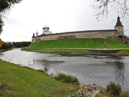 The impregnable walls of the Kremlin and the golden domes of the Cathedrals in the Russian city of Pskov. September 2018.のeditorial素材
