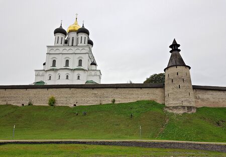 The impregnable walls of the Kremlin and the golden domes of the Cathedrals in the Russian city of Pskov. September 2018.のeditorial素材