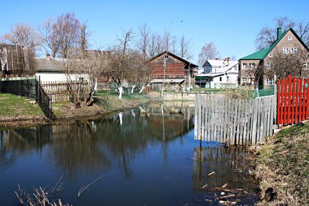 Wooden houses on the outskirts of the Russian city of Pechora. April 2019.のeditorial素材