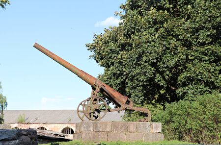 The old military gun as an exhibit in the Daugavpil fortress. Latvia, July 2019.のeditorial素材