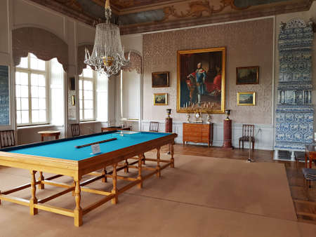 Table for playing billiards in the richly decorated room of the Rundale Castle in Latvia in spring 2019.のeditorial素材