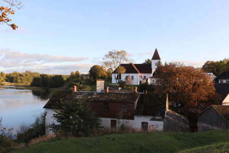 Church of Saint Michael in the Latvian village of Alsunga at sunset in October 2020.