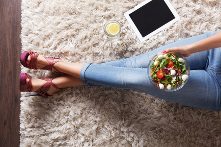 woman eating salad woman eating salad