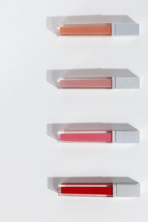 Close-up of colorful lipglossesの写真素材